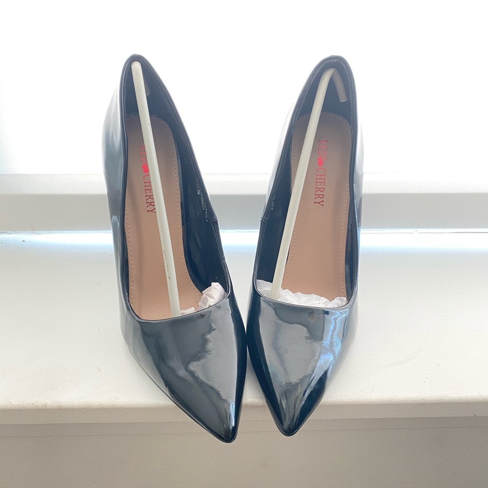 Black shiny heels